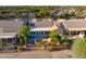 House with solar panels, a large patio, and a circular fountain at 3533 N 159Th Ln, Goodyear, AZ 85395