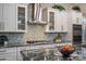 Updated kitchen with granite countertops and white cabinetry at 3533 N 159Th Ln, Goodyear, AZ 85395