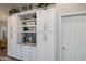 White kitchen cabinets and granite countertops at 3533 N 159Th Ln, Goodyear, AZ 85395