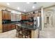 Spacious kitchen with island and stainless steel appliances at 3551 W Hidden Mountain Ln, Anthem, AZ 85086