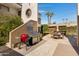 Outdoor kitchen with grill and patio seating at 3619 E Monterosa St # 209, Phoenix, AZ 85018