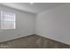 Simple bedroom with a window and neutral wall colors at 4342 E Enmark Dr, San Tan Valley, AZ 85143