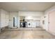 Interior laundry room with washer, dryer, and cabinets at 4402 E Cheyenne Dr, Phoenix, AZ 85044