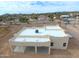 Aerial view of a new stucco home, highlighting its roofline and backyard space at 48111 N 7Th Ave, New River, AZ 85087