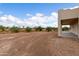 Large backyard with desert landscaping and new home at 48111 N 7Th Ave, New River, AZ 85087