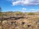 This desert lot boasts mountain views and open space at 48111 N 7Th Ave, New River, AZ 85087