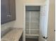 Well-lit pantry with ample shelving for food storage at 48111 N 7Th Ave, New River, AZ 85087