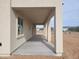Covered patio, concrete flooring, and views of the desert landscape at 48111 N 7Th Ave, New River, AZ 85087