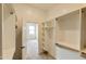 Large walk-in closet with shelves and hanging rods at 48111 N 7Th Ave, New River, AZ 85087