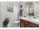 Clean bathroom with a vanity, toilet, and shower/tub combo at 5230 W El Cortez Trl, Phoenix, AZ 85083