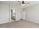 Bedroom with carpet, ceiling fan and ensuite bathroom at 5451 W Victory Way, Florence, AZ 85132