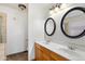 Bathroom boasts double sinks and updated vanity at 5525 W Harrison Ct, Chandler, AZ 85226