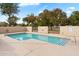 Community swimming pool with surrounding trees at 5525 W Harrison Ct, Chandler, AZ 85226