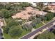 Aerial view of a luxurious estate with extensive landscaping and mountain views at 6240 N 59Th Pl, Paradise Valley, AZ 85253