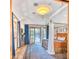 Spacious bedroom with a four-poster bed and access to the backyard at 6240 N 59Th Pl, Paradise Valley, AZ 85253