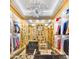 Large walk-in closet with ample storage space and custom shelving at 6240 N 59Th Pl, Paradise Valley, AZ 85253