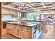 Gourmet kitchen boasts double islands, high-end appliances, and ample counter space at 6240 N 59Th Pl, Paradise Valley, AZ 85253