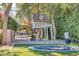 Charming play area with treehouse, slide, and trampoline at 6240 N 59Th Pl, Paradise Valley, AZ 85253