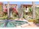Private spa surrounded by lush landscaping and cacti at 6240 N 59Th Pl, Paradise Valley, AZ 85253