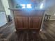 Kitchen island with wood cabinets and granite countertop at 650 N Hawes Rd # 3729, Mesa, AZ 85207