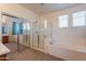 Bathroom with shower, bathtub, and mirrored closet at 10419 E Kiva Ave, Mesa, AZ 85209
