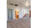 Bedroom with bathroom and loft access at 10419 E Kiva Ave, Mesa, AZ 85209