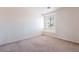 Bedroom with window seat and neutral decor at 10419 E Kiva Ave, Mesa, AZ 85209