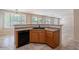 Kitchen features a large island and black appliances at 10419 E Kiva Ave, Mesa, AZ 85209