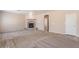 Living room features a fireplace and neutral color palette at 10419 E Kiva Ave, Mesa, AZ 85209