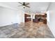 Bright and airy Gathering room with tile flooring and ceiling fan at 11013 E Quarry Cir, Mesa, AZ 85212