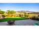 Artificial turf and brick patio with mountain views at 12082 E Fossil Spgs, Gold Canyon, AZ 85118