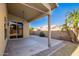 Covered patio with sliding glass doors leading to the house at 123 S Cobblestone Dr, Gilbert, AZ 85296