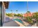 Spacious balcony overlooking a sparkling pool and picturesque neighborhood at 15519 E Chicory Dr, Fountain Hills, AZ 85268