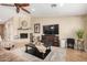 Living area with fireplace and ample natural light at 15519 E Chicory Dr, Fountain Hills, AZ 85268