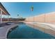 Enjoy this refreshing pool with a large, private backyard at 174 W 15Th Ave, Apache Junction, AZ 85120