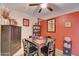 Small dining area with a table and four chairs, and an accent wall at 216 W Atlantic Dr, Casa Grande, AZ 85122