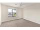 Spacious bedroom with neutral carpeting and large window at 225 W 1St St # 124, Mesa, AZ 85201