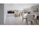 Light and airy dining area adjacent to the kitchen and fireplace at 2349 W Le Marche Ave, Phoenix, AZ 85023