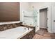 Relaxing bathroom with soaking tub and walk-in shower at 25403 N 71St Dr, Peoria, AZ 85383