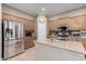 Kitchen with stainless steel appliances and large island at 25403 N 71St Dr, Peoria, AZ 85383