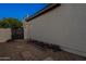 Side yard with gate and landscaping at 26617 S Sedona Dr, Sun Lakes, AZ 85248