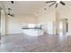 Open concept kitchen with large island and white cabinets at 2696 N 162Nd Ln, Goodyear, AZ 85395