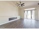 Spacious living room with sliding glass doors and wood-look flooring at 2696 N 162Nd Ln, Goodyear, AZ 85395