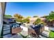 Backyard with fire pit, pool, and patio furniture at 3811 S St Claire --, Mesa, AZ 85212