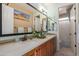 Elegant bathroom with dual sinks, large mirror, and shower at 3811 S St Claire --, Mesa, AZ 85212