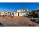 Two-story house with a large driveway and desert landscaping at 3811 S St Claire --, Mesa, AZ 85212