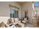 Comfortable balcony furniture with sliding glass door access at 5350 E Deer Valley Dr # 3418, Phoenix, AZ 85054