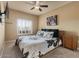 Bright bedroom with a king-size bed and window shutters at 5350 E Deer Valley Dr # 3418, Phoenix, AZ 85054