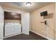Laundry room with washer, dryer, cabinets and tiled floor at 5350 E Deer Valley Dr # 3418, Phoenix, AZ 85054
