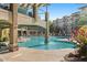 Community pool with a fountain and surrounding landscaping at 5350 E Deer Valley Dr # 3418, Phoenix, AZ 85054